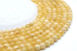 Perles Calcita Orange 8mm sobre fil 40cm